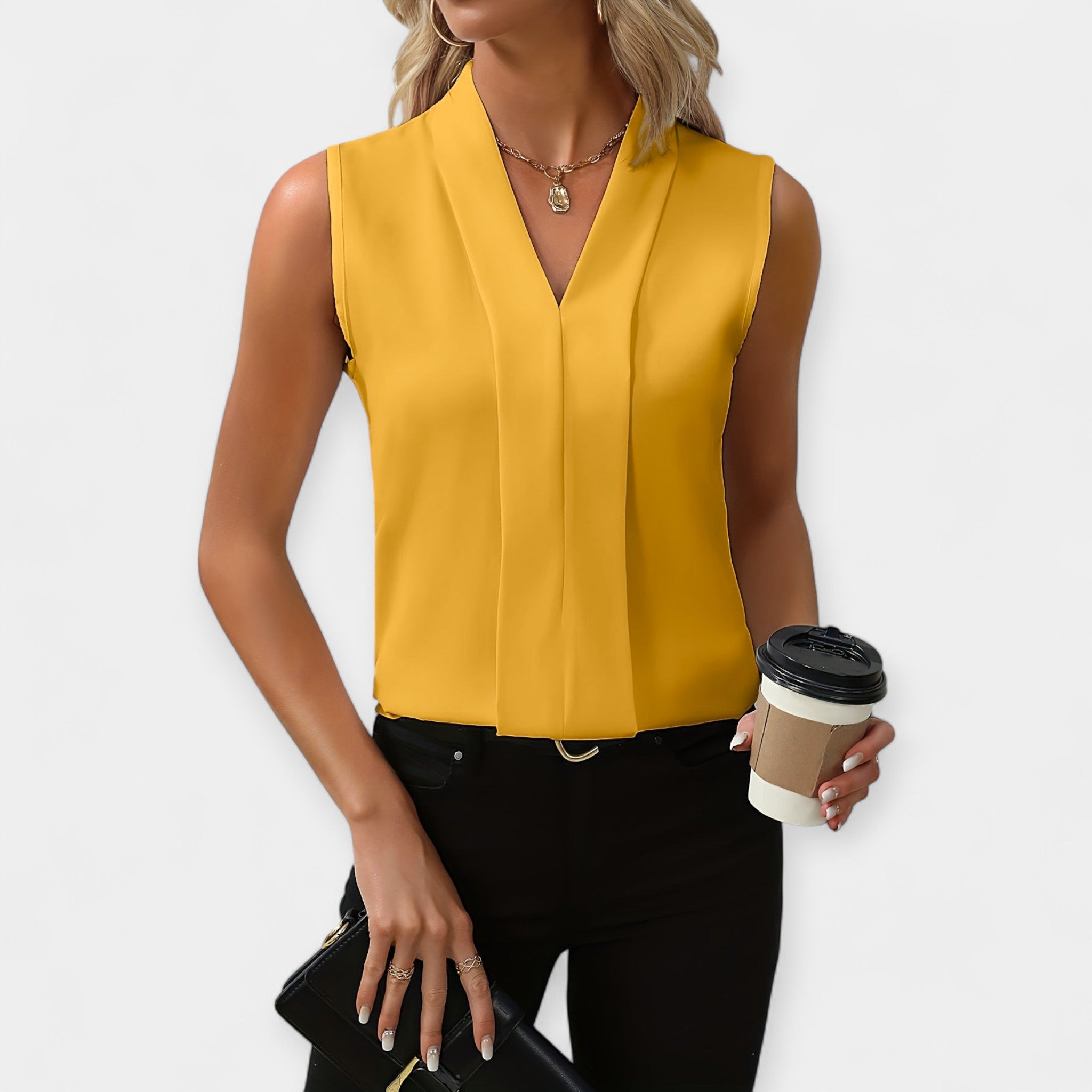 Classy Sleeveless Blouse With Deep V Neck And Loose Fit