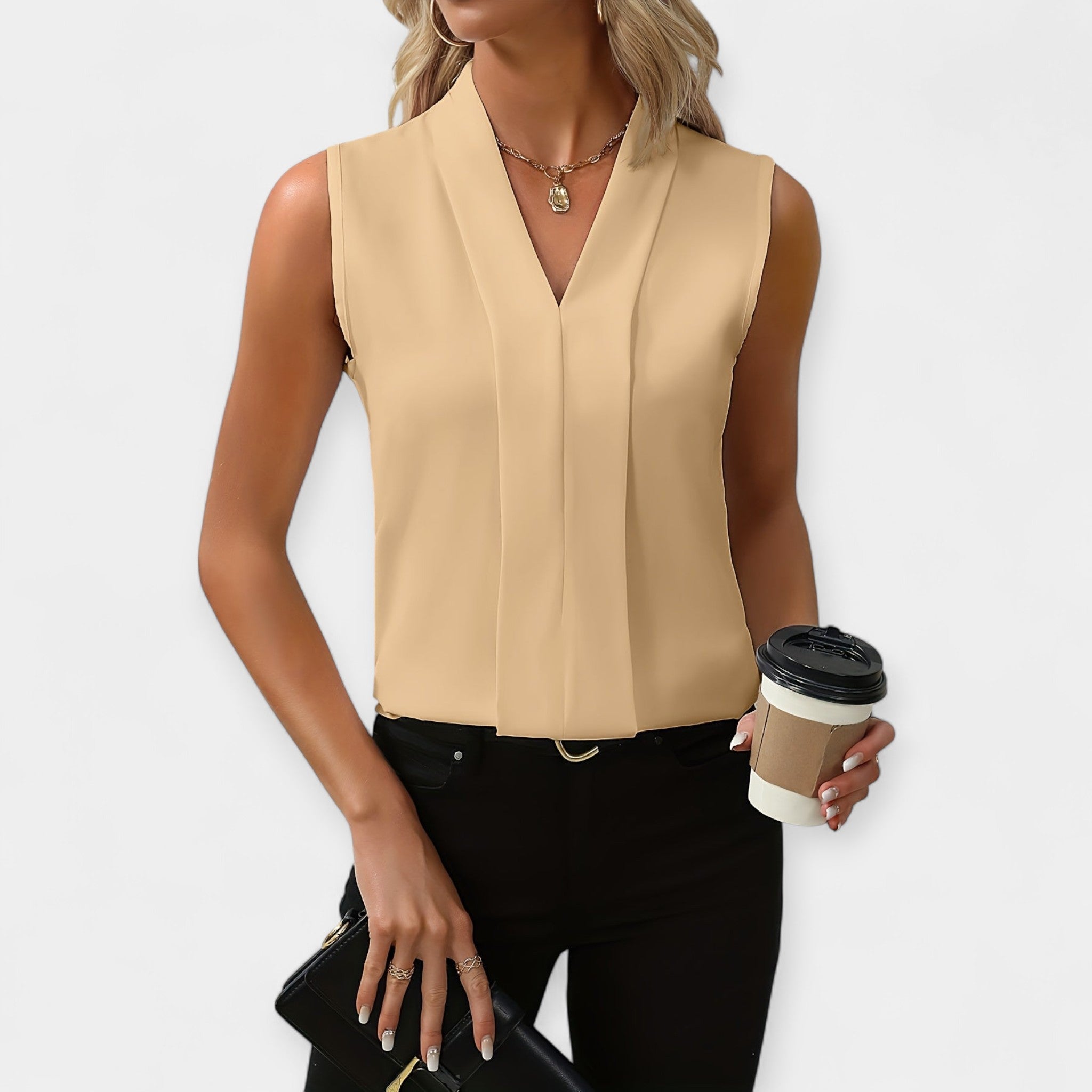 Classy Sleeveless Blouse With Deep V Neck And Loose Fit